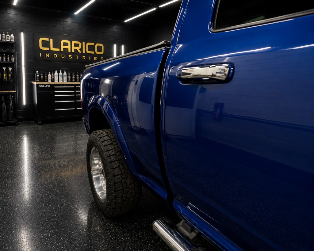 Paint correction on blue truck with swirl marks removed, after